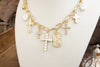 Radiant Faith – Mixed Charm Cascade Necklace in Gold Tone