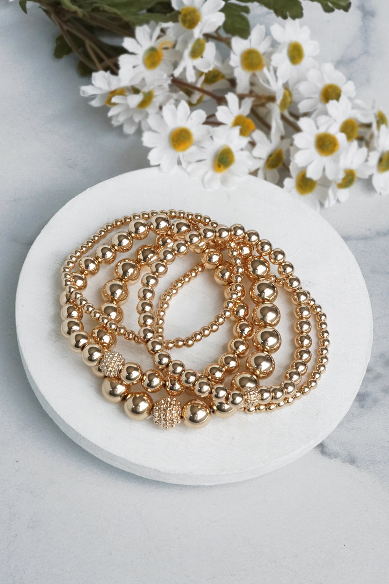Multi size ball beaded bracelet stack Gold tone bracelet set