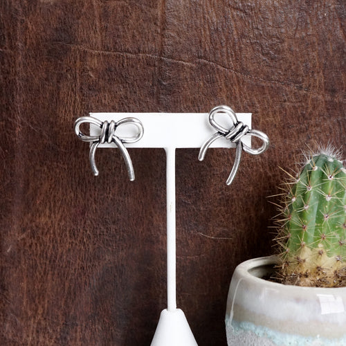 Western Bow Statement Earrings – Worn Silver Tone