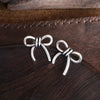 Western Bow Statement Earrings – Worn Silver Tone