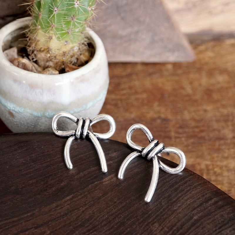 Western Bow Statement Earrings – Worn Silver Tone