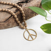 Long Wood Bead Necklace with golden peace sign pendant - Natural Beige