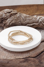Small Worn Gold tone and Glass beads bracelet stack of 4 bracelets