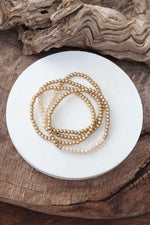 Small Worn Gold tone and Glass beads bracelet stack of 4 bracelets