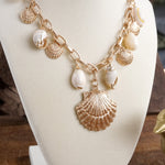 Multi-Charm Sea Life Statement Necklace with Shells and Golden Charms