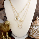 Sweet Keepsake – Multi-Layer Necklace with Hearts, Bow & Pearl