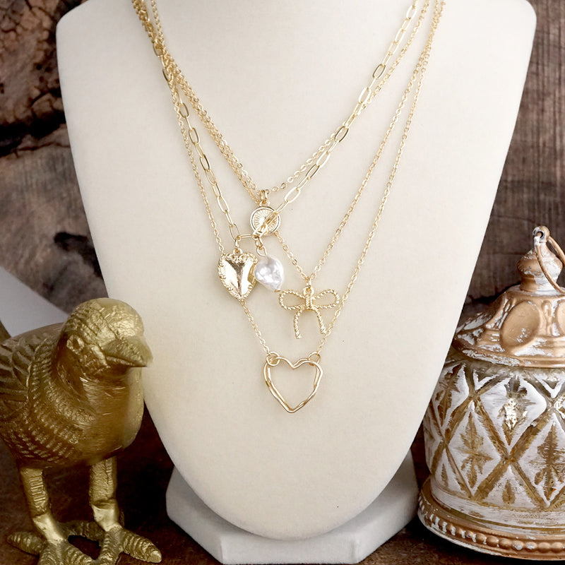 Sweet Keepsake – Multi-Layer Necklace with Hearts, Bow & Pearl