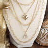 Hearts Entwined – 5-in-1 Layered Necklace with Hammered Heart & Teardrop Crystal