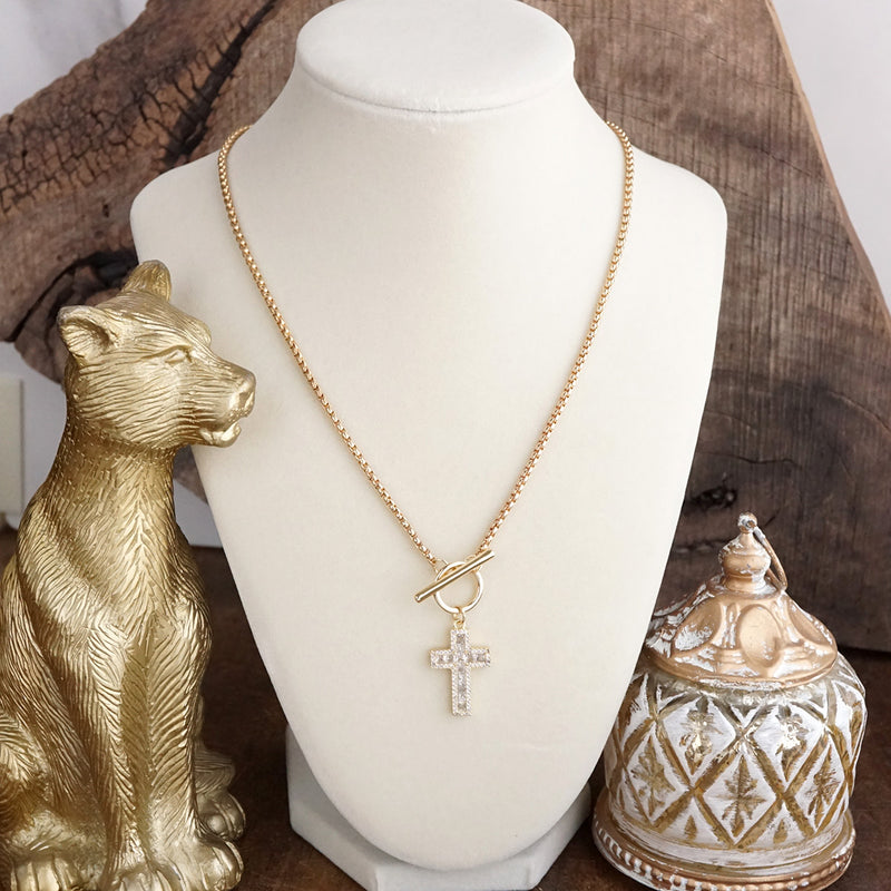Radiant Devotion – Crystal Cross Toggle Necklace in Gold