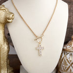 Radiant Devotion – Crystal Cross Toggle Necklace in Gold
