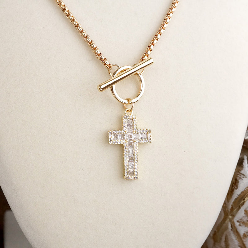 Radiant Devotion – Crystal Cross Toggle Necklace in Gold