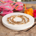 Gold Tone Beaded bracelets set with Clear Crystals