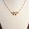Fancy Bow Necklace - Short dainty station chain in gold tone