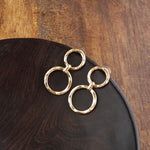 Golden Orbit – Double Hammered Hoop Drop Earrings