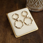 Golden Orbit – Double Hammered Hoop Drop Earrings