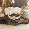 Golden Balance – Minimalist Sideways Cross Stretch Bangle