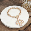 Divine Gleam – Hammered Cross Toggle Bracelet with Pearls & Crystals