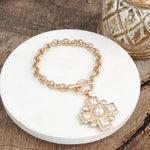 Divine Gleam – Hammered Cross Toggle Bracelet with Pearls & Crystals