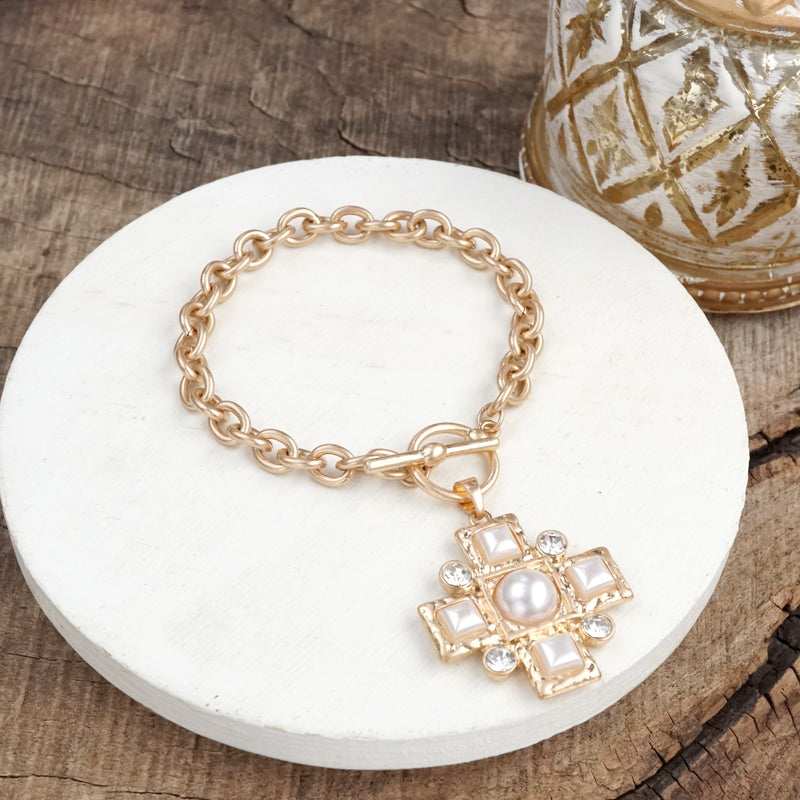 Divine Gleam – Hammered Cross Toggle Bracelet with Pearls & Crystals