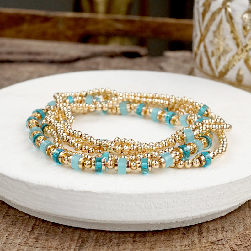 Aqua Glow – Beaded Bracelet Stack in Gold and Cool Blues (Set of 5)