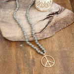 Long Wood Bead Necklace with golden peace sign pendant - Gray