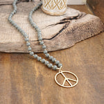 Long Wood Bead Necklace with golden peace sign pendant - Gray