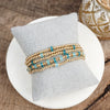 Aqua Glow – Beaded Bracelet Stack in Gold and Cool Blues (Set of 5)