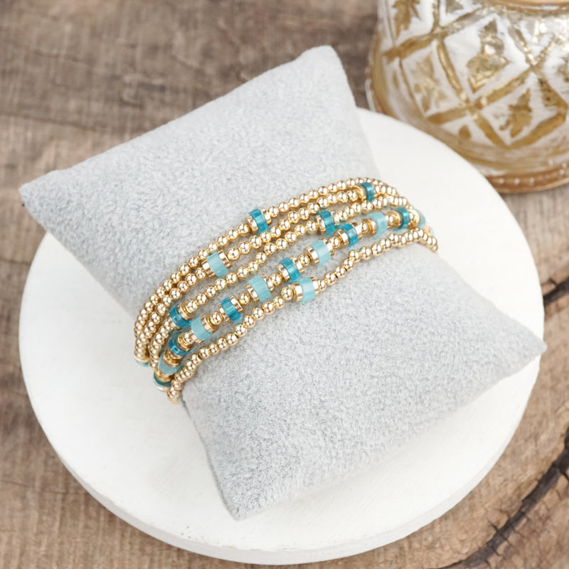 Aqua Glow – Beaded Bracelet Stack in Gold and Cool Blues (Set of 5)