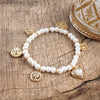 Golden Reverie – Multi-Charm Pearl Stretch Bracelet