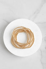 Small ball beads bracelet stack of 5 bracelets Worn Gold