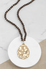 Long Wooden Bead Necklace with gold teardrop - Brown