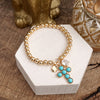 Golden Keepsakes – Charm Cluster Stretch Bracelet with Beads & Stones