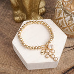 Golden Keepsakes – Charm Cluster Stretch Bracelet with Beads & Stones