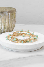 Small Gold tone and Glass beads bracelet stack of 3 bracelets
