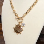 Front Toggle Hammered Coin & Crystal Charm Necklace – Gold Tone