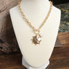 Front Toggle Hammered Coin & Crystal Charm Necklace – Gold Tone