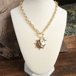 Front Toggle Hammered Coin & Crystal Charm Necklace – Gold Tone