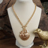 Front Toggle Multi-Charm Shell Statement Necklace – Gold Tone