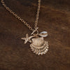 Front Toggle Multi-Charm Shell Statement Necklace – Gold Tone