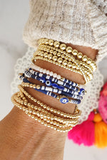 Small ball beads bracelet stack of 5 bracelets Worn Gold