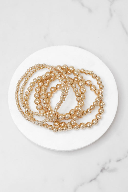 Multi size ball beaded bracelet stack gold tone bracelets
