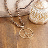 Long Wood Bead Necklace with golden peace sign pendant - Brown