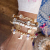 Golden Reverie – Multi-Charm Pearl Stretch Bracelet