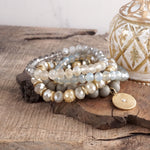 Beaded bracelets set in Gray with a coin charm