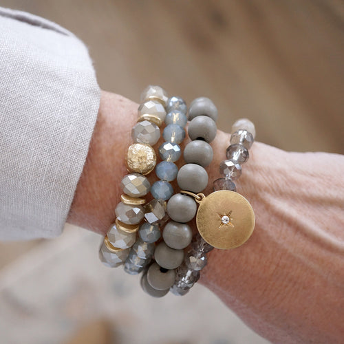 Beaded bracelets set in Gray with a coin charm